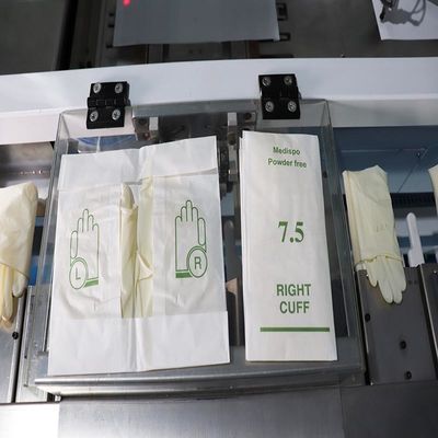 Servo aangedreven chirurgische handschoenenverpakkingsmachine voor papierlijm portemonnee