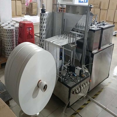 Verpakkingsmachine voor vierzijdig afdichten van papier-AL-composite film met snij-alcohol-pre-pads